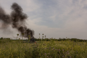 May 9, 2015 – Giugliano, Italy: A toxic fire near a Roma camp. The area near the camp is full of illegal dump and toxic refusals.