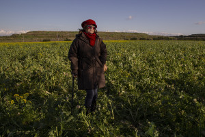 January 28, 2014 – Giugliano, Italy: The activist Lucia De Cicco portrayed in the so-called area Vasto, full of toxic waste underground and illegal dumps close to the farmlands. Lucia, during a protest of 2008 against the re-opening of the storage site Taverna del Re, set herself on fire.