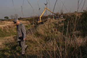 January 13, 2014 – Villa di Briano, Italy: A forester digs in a field that, according to repent of Camorra, was used as a toxic waste dump near Caserta.