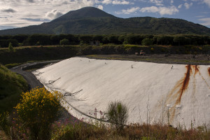 May 23, 2015 – Terzigno, Italy: A general view of Cava Sari landfill, a collection site of non-recyclable dry waste in “Pozzelle”. Cava Sari, located in the Vesuvius National Park in an old quarry of lava stone, currently holds 972,000 cubic meters of waste (among which there may be also radioactive waste) in front of a capacity of 730,000 cubic meters, characterized by being one of the largest landfills in the region.