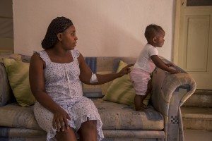 Alima Ibrahim from Nigeria and beneficiary of the protection systems for asylum seekers and refugees is seen with her daughter Mariella in the house where she lives in Petruro Irpino, southern Italy on June 14, 2017. Petruro Irpino is an Italian small village with 367 inhabitants in the province of Avellino in Campania, which is claiming to be an efficient model of integration and where people of different religions and coming from different parts in the world peaceful live together.