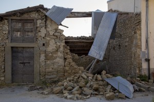 A collapsed building is seen almost one year after the earthquake in the village of Retrosi, central Italy on July 31, 2017. Italy was struck by a powerful 6.2 magnitude earthquake in the night of August 24, 2016 which has killed at least 297 people and devastated dozens of houses in the Lazio village of Amatrice and other Amatrice fractions.