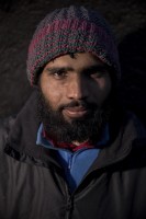 Amanullah, 23 years old from Gujrat, 
Pakistan is portrayed outiside a reception center in Velika Kladusa, Bosnia and Herzegovina on November 30, 2018.