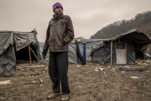 A migrant is seen inside a refugee camp in Velika Kladusa, Bosnia and Herzegovin on November 30, 2018.
