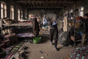 Migrants are seen inside an abandoned building where they took refuge in the outskirts of the Bosnian city of Bihać, Bosnia and Herzegovina on December 2, 2018.