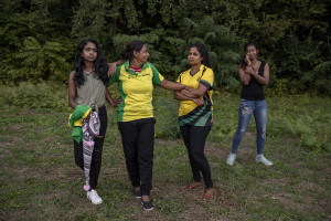 Players are seen before a match of “elle” in Naples, Italy on September 29, 2019. Every Sunday hundreds of people belonging to the Sri Lankan community in Italy gather in the “Real Bosco di Capodimonte” of Naples and play “elle”, a very popular Sri Lankan bat-and-ball game, often played in rural villages and urban areas.