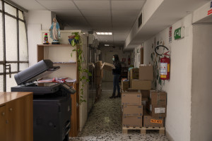 A worker from “San Gennaro dei Poveri” hospital prepares medicines for the Italian Red Cross voluteers to be distributed at home to older people, during coronavirus emergency in Naples, Italy on April 2, 2020.