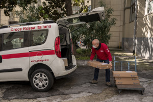 Patrizio, 53 years old and volunteer of the Italian Red Cross for about 1 years collects medicines to be distributed at home to older people from “San Gennaro dei Poveri” hospital, during coronavirus emergency in Naples, Italy on April 2, 2020.