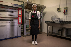 A portrait of Glory, 21 years old from Edo State, Nigeria inside the company “Al volo” where she has been doing an internship for 5 months in Monale, in the province of Asti, Northern Italy, on January 13, 2020.