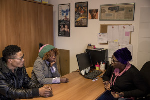 Faith, 29 years old from Delta State, Nigeria and her boyfriend John, 31 years old from Nigeria hold an interview with Fatima (one of the managers of the Piam non-profit organization) to discuss their work situation and their progress in learning Italian language in Asti, Northern Italy on January 10, 2020.