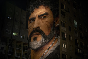 A mural of the Argentine soccer legend Diego Armando Maradona is seen after the announcement of his death in San Giovanni a Teduccio, near Naples, Italy on November 25, 2020.