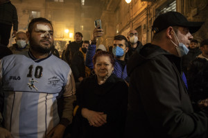 NAPLES, ITALY – NOVEMBER 25: Supporters are seen during a commemoration organized on the occasion of the anniversary death of the Argentinian soccer legend Diego Armando Maradona at Spanish quarter, in Naples, Southern Italy on November 25, 2021.