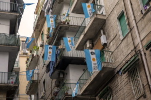 Flags dedicated to the Argentine soccer legend Diego Armando Maradona are seen in the Spanish Quarter in Naples, Southern Italy on November 23, 2021. Diego Armando Maradona died on November 25 of last year and next November 25, 2021 will be the anniversary of his death.