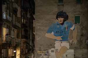 A mural depicting the Argentine soccer legend Diego Armando Maradona is seen in the Spanish Quarter after the announcement of his death in Naples, Italy on November 25, 2020.