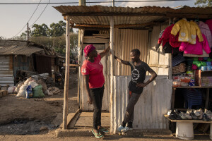 Dance Centre Kenya student Bravian Mise, 14 years old (right) and his mother Rehema Mwikali, 35 years old (left) are seen at Kuwinda slum in Nairobi, Kenya on October 10, 2024. The main purposes of Dance Centre Kenya is to provide international training for talented young dancers, regardless of their background or nationality. It also represents a bridge between Africa and foreign countries, giving dozens of less fortunate children the chance to dream of a better future.