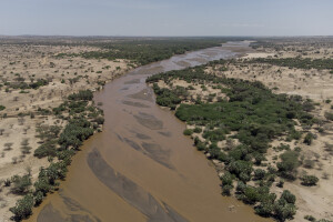 A general view of the dried Turkwel River in Chok Chok village, located in Turkana County, northwest Kenya on October 14, 2024. Kenya’s rivers are drying up rapidly, with low rainfall and global warming being among the main causes of this phenomenon.