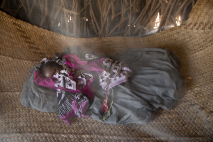 Akaru, one-week-old sleeps in a hut in Chok Chok village, located in Turkana County, northwest Kenya on October 14, 2024. Due to the severe drought that is affecting the country, Akaru is forced to drink the water that her mother Selina fetches from the nearest river – located about 15 kilometers from their village – which is not clean and often causes infections or diseases, including dysentery, a leading cause of death among children under 5.