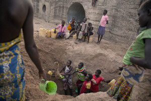 Women fetche water from the dried Kalotumum River in Kerio, located in Turkana County, northwest Kenya on October 17, 2024. Due to the severe drought that is affecting the country, many people are forced to drink water that they fetch from the underground, which is not clean and often causes infections or diseases. According a 2023 UN Water Development Report, groundwater levels are falling, forcing some communities to drill wells twice as deep as they were a decade ago.